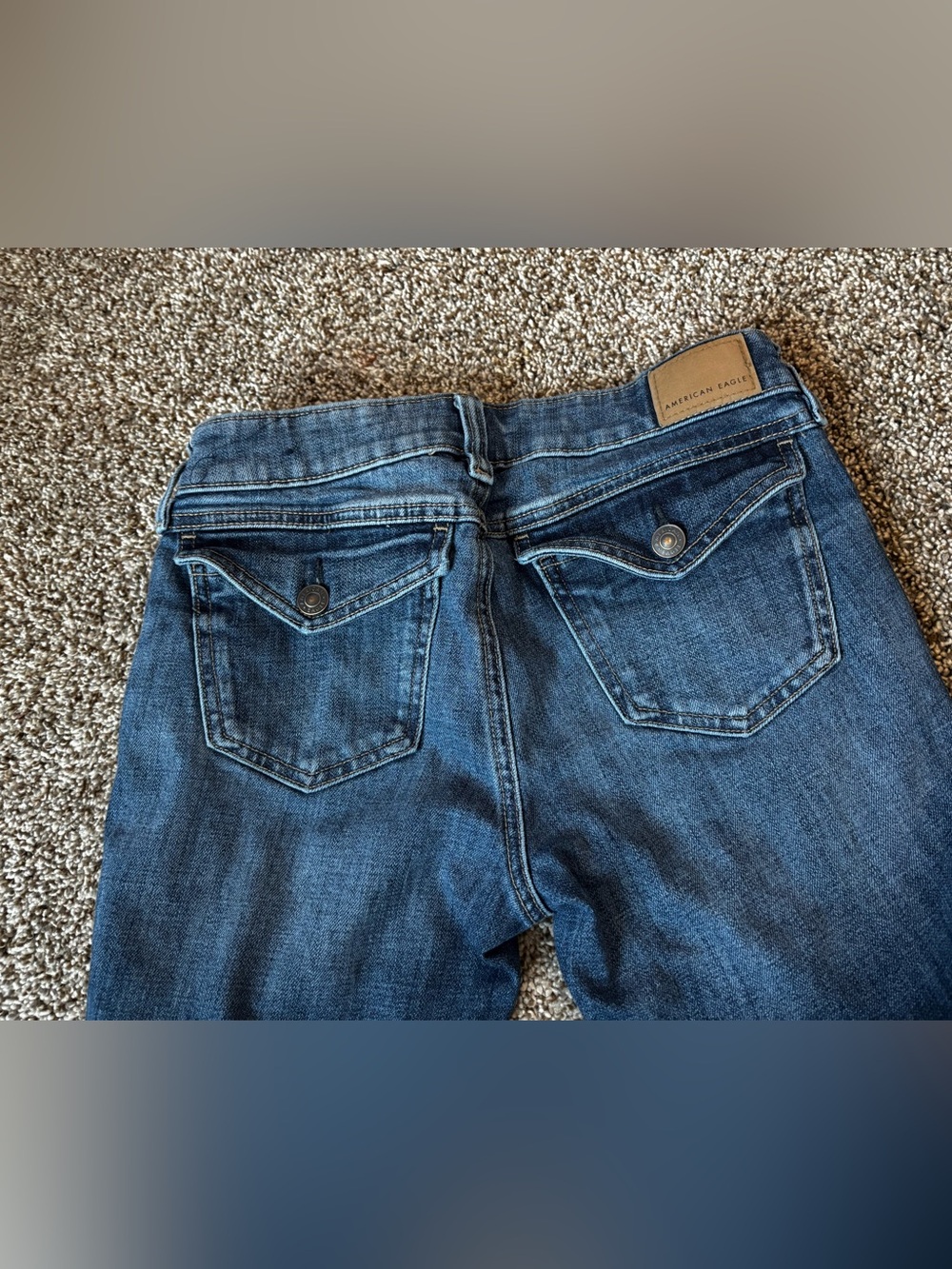American Eagle Outfitters women’s super low rise kick boot Jeans